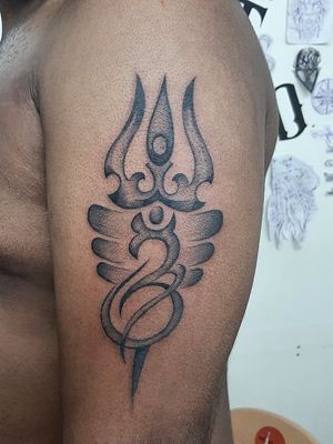 Trident tattoo by nativeinkblottattoos #nativeinkblottattoos #tridenttattoo #trident #neotrival #ohm #blackandgrey #arm