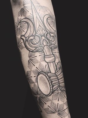 Trident tattoo by Rose Tattoo #RoseTattoo #tridenttattoo #trident #drum #sacredgeometry #dotwork #linework 