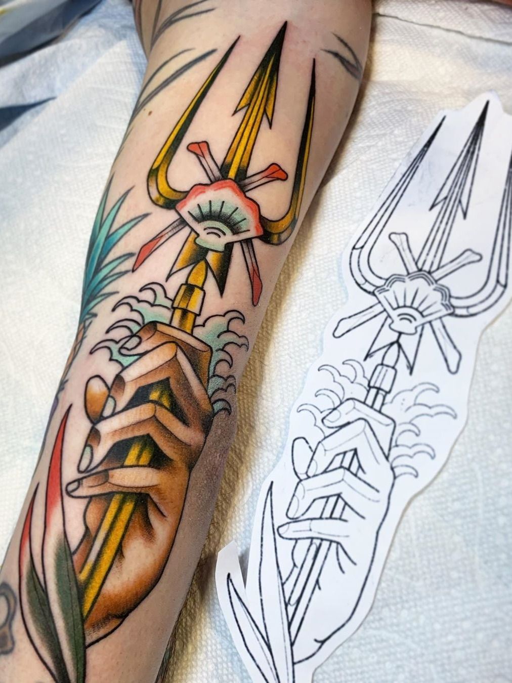 Tattoo uploaded by Jennifer R Donnelly • Trident tattoo by Baz Tattoos  #baztattoos #tridenttattoo #trident #traditional #hand #leaves #color  #neotraditional #upperarm • Tattoodo