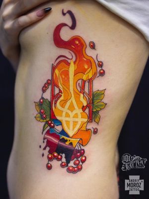 Trident tattoo by Moroz Tattoo Art #MorozTattooArt #tridenttattoo #trident #neotraditional #fire #side #ribs #berries