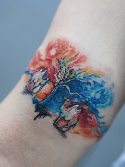 Watercolor tattoo by Denon Tattoo #DenonTattoo #Denon #watercolor #natural #organic #flowing #nature #floral #water #arm