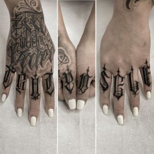 Lettering hand tattoo by Lil Jeon #LilJeon #blackandgrey #realism #lettering #hand #fingertattoo