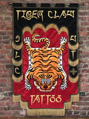 A banner by Meghan McAleavy for Tiger Claw Tattoo #MeghanMcAleavy #banner #textileart #tattooart 