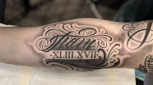 Lettering tattoo by Lil Jeon #LilJeon #blackandgrey #realism #lettering #script #romannumerals #quote #name