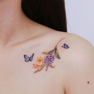 Watercolor tattoo by Donghwa of Studio by Sol #Donghwa #StudiobySol #Seoul #Koreanartist #Koreantattooartist #watercolor #fineline #detailed #color #nature #floral #butterfly