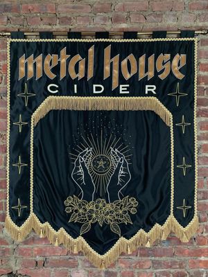 A banner by Meghan McAleavy for Metal House Cider #MeghanMcAleavy #banner #textileart #tattooart 
