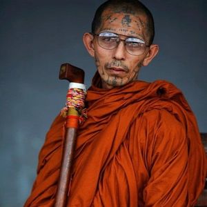 Portrait of a tattooed monk in Thailand by Damir Sagolj #DamirSagolj #Buddhisttattoos