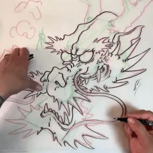 Enter the Dragon: Bill Canales demonstrates drawing dragons.