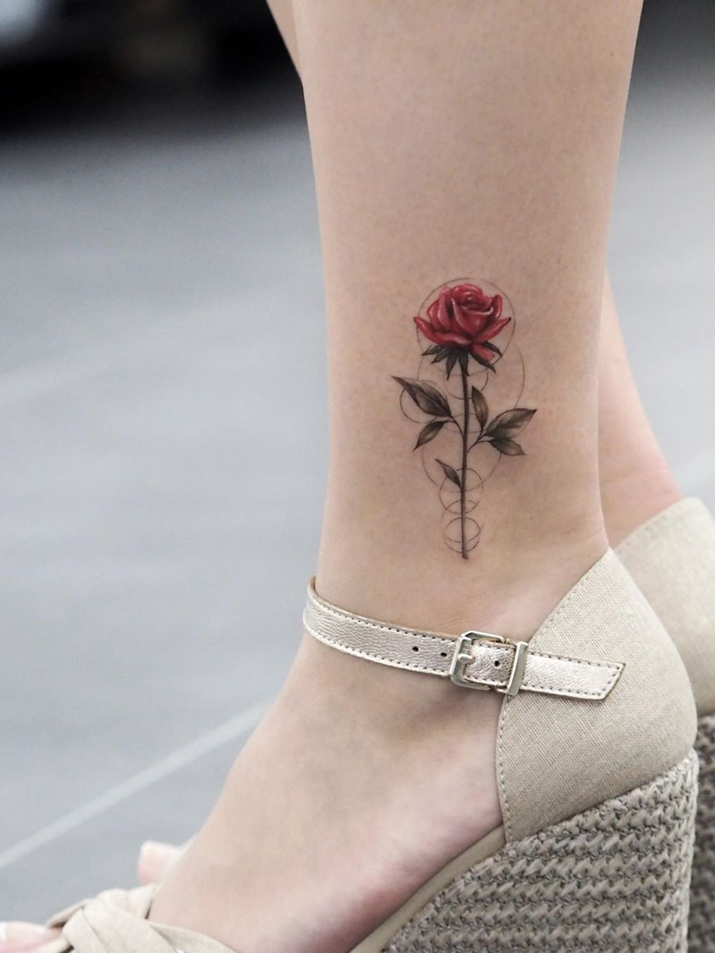 Little red rose tattoo on the left ankle  Tattoogridnet