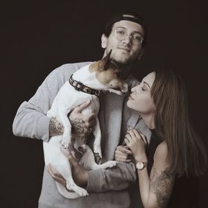 Ali with his wife and pup