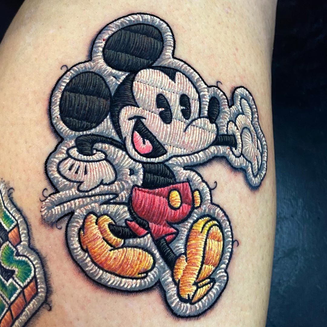 Tattoo uploaded by Tattoodo • Embroidery tattoo by dudalozanotattoo #dudalozanotattoo #embroiderytattoo #threadtattoo #sewingtattoo #art #craft #mickeymouse #disney • Tattoodo