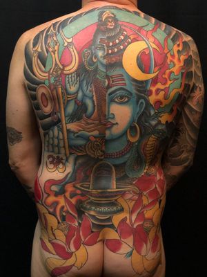 Tattoo by Dana James #DanaJames #Shiva #backpiece #backtattoo #flower #lotus #trident #hindu #om #color #fire