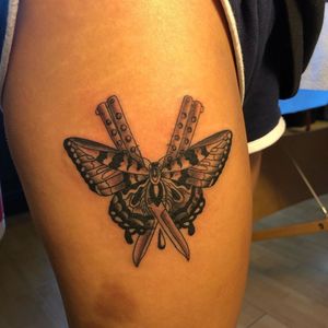 Tattoo by Dana James #DanaJames #butterfly #oldschool #illustrative #switchblade #knife #dagger #thigh