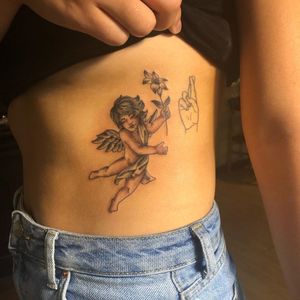 Tattoo by Dana James #DanaJames #cherub #illustrative #oldschool #angel #flower #ribs