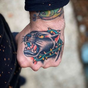 Tattoo by Joe Chatt #JoeChatt #traditional #japanese #color #punk #panther #thorns #hand