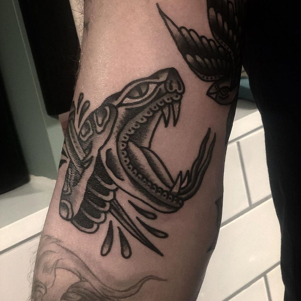 Old Tattoos Renewed: A Snake and Dagger Tattoo Story • Tattoodo Old Tattoos Renewed: A Snake and Dagger Tattoo Story • Tattoodo