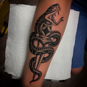 Snake and dagger tattoo by Shane Boulger #ShaneBoulger #snakeanddagger #traditional #oldschool #snake #dagger