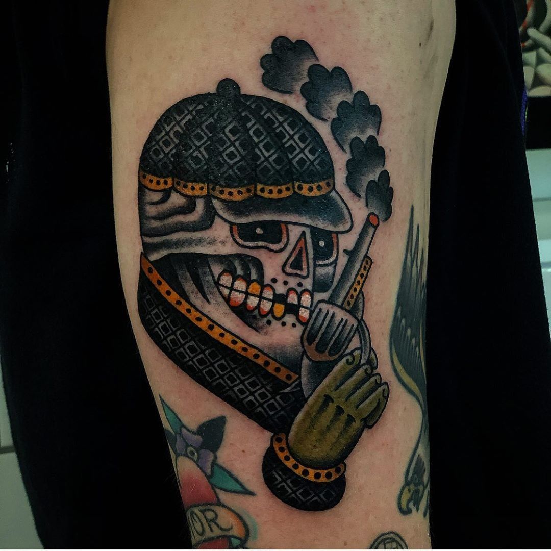 Skull With Gun Tattoo On Man Side Neck