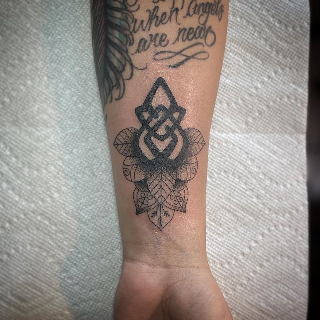 Infinity symbol tattoo for cancer survivor
