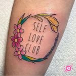 Self love club tattoo by ieshagoddentattoo #ieshagoddentattoo #selfloveclub #flower #floral #wreath #sexualassaultawarenesstattoo #sexualassaultsurvivortattoo #survivortattoo #tattoosforstrength #selflove #empoweringtattoos #frame #color