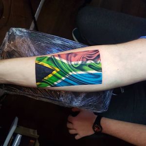 South African flag tattoo by Dean Gunther #DeanGunther #southafrica #flag #africatattoo #african #color #realism