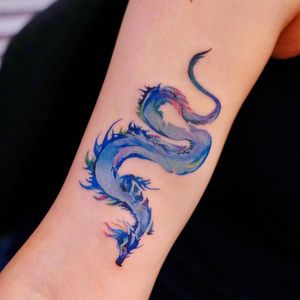 Watercolor tattoo by 9room #9room #watercolor #color #unique #nature #dragon #magic #mystical #folklore