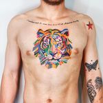 Watercolor tattoo by 9room #9room #watercolor #color #unique #nature #tiger #lion #cat #chesttattoo 
