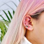 Watercolor tattoo by 9room #9room #watercolor #color #unique #nature #ear #flower #floral 