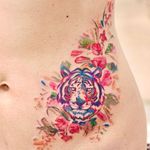 Watercolor tattoo by 9room #9room #watercolor #color #unique #nature #tiger #flower #floral #animal 