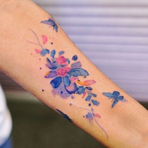 Watercolor tattoo by 9room #9room #watercolor #color #unique #nature #flower #florals