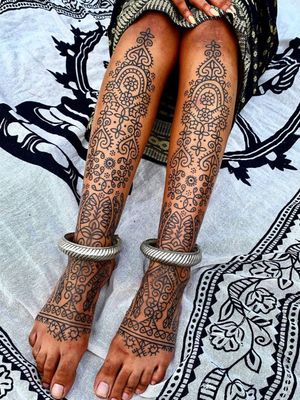 Pattern work tattoo by Swasthik Iyengar aka Gunga Ma #SwasthikIyengar  #GungaMa #color #traditional #Hindu #sacredsymbols #sacrediconography #pattern #folkart #linework #dotwork #floral #foot #shin