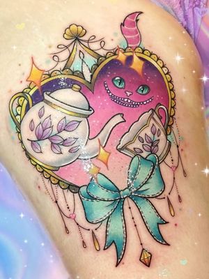 Alice in Wonderland tattoo by Dualypulp.tattoo #dualypulptattoo #aliceinwonderland #newschool #heart #tea #teacup #bow #cat #cheshirecat #star