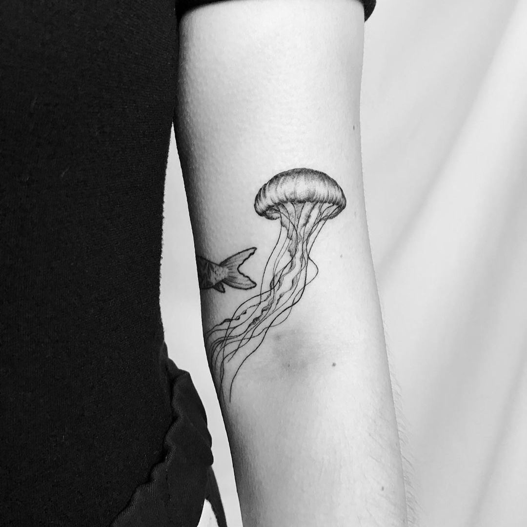 Jellyfish tattoo on the rib