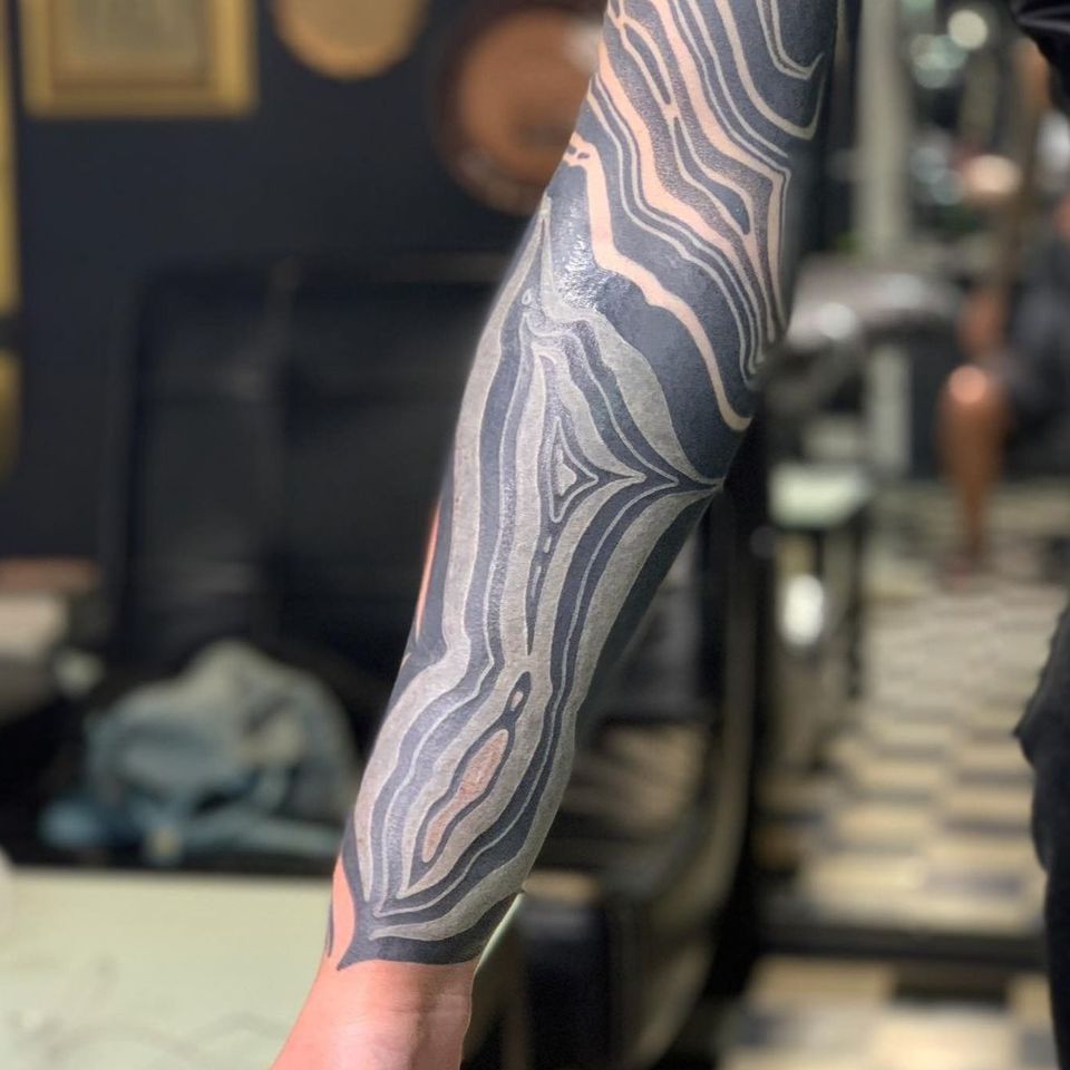 Blackout Tattoo: Process, Pain Level, Healing Time & More