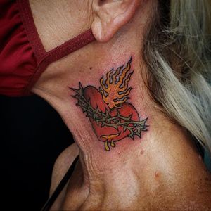 sacred heart tattoo by nick wallin #nickwallin #sacredheart #thorns #fire #neck