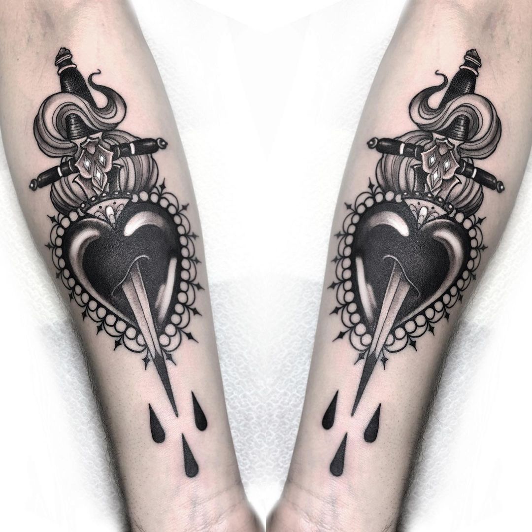 Heart pierced with dagger black and white tattoo Vector Image