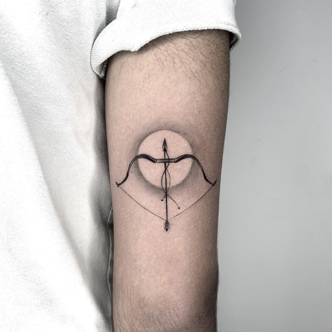 Realistic Grey Ink Sagittarius Tattoo On Left Leg