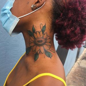 Neck tattoo by Chuck Jones aka heavyaxes #ChuckJones #heavyaxes #sunflower #neck #flower #tattoosondarkskin #darkskin