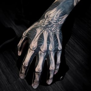 Skeleton hand by hank_hua_tattoo #hankhuatattoo #skeletonhand #bones #blackandgrey #realism #spider #darkart