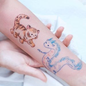 Crayon tattoo by haenal tattoo #haenaltattoo #cat #dragon #tiger #haku #spiritedaway #chineseastrology #crayon