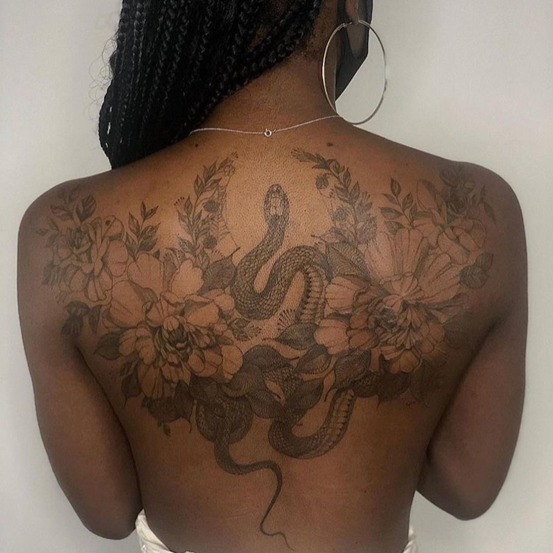 Floral design mixed with snake Back  Panda ink tattoo  Facebook