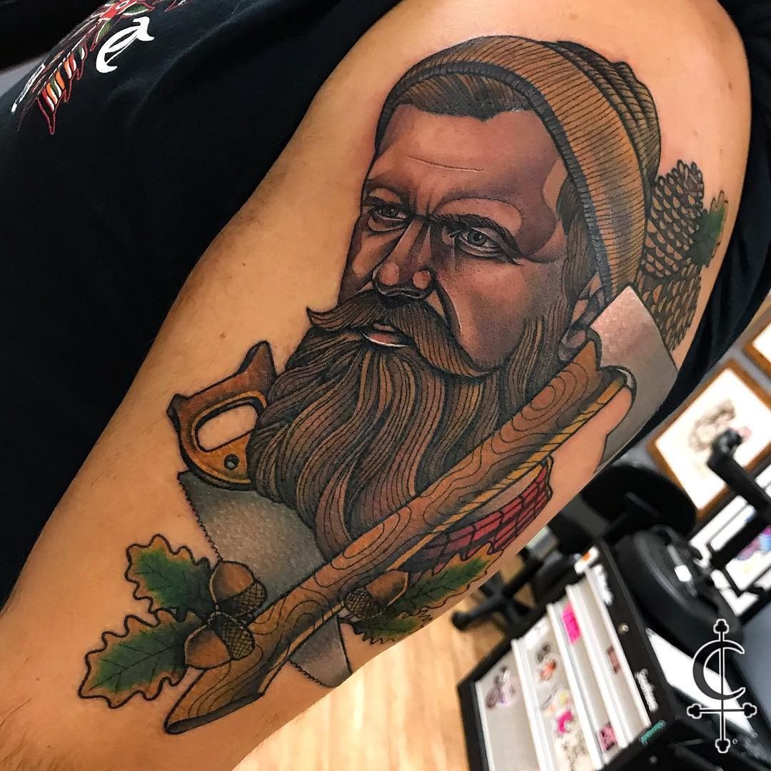 Tattoo uploaded by Jennifer R Donnelly • Lumberjack tattoo by Bobby Dunbar  #BobbyDunbar #lumberjacktattoo #lumberjack #nature #hatchet #trees  #forestry #portrait #rose #beard • Tattoodo