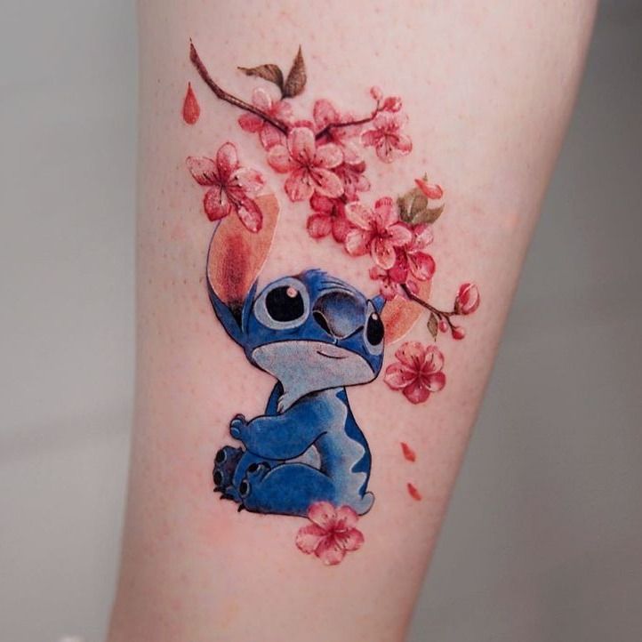 Lilo and stitch watercolor tattoo  Starry Eyed Tattoos and Body Art Studio
