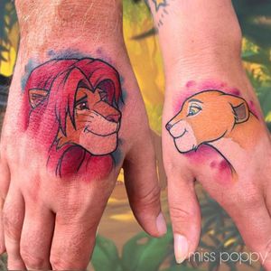Disney couple tattoo by miss poppy tattoo #misspoppytattoo #disneycoupletattoo #disneymatchingtattoo #matchingtattoo #coupletattoo #lionking #handtattoo #disneytattoo #disney #waltdisney