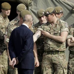 Prince Philip, Duke of Edinburgh admiring the tattoos of a soldier in Aldershot #tattooedroyals #militarytattoos #historyoftattooing