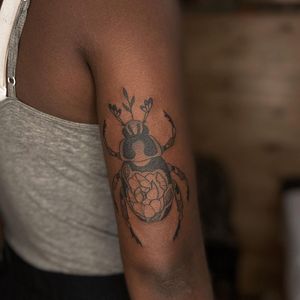 Illustrative tattoo by Nicolas Trotman aka Nick Trotman #NicolasTrotman #NickTrotman #illustrative #blackandgrey #nature #plant #beetle #rose #peony #flower #floral #insect #tattoosondarkskin #darkskintattoos #queertattooer #lgbtqia #bipoc #qttr #lgbt #qt