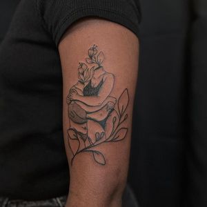 Illustrative tattoo by Nicolas Trotman aka Nick Trotman #NicolasTrotman #NickTrotman #illustrative #blackandgrey #nature #plant #flower #floral #love #headless #headlessbody #hug #tattoosondarkskin #darkskintattoos #queertattooer #lgbtqia #bipoc #qttr #lg