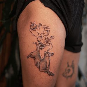 Illustrative tattoo by Nicolas Trotman aka Nick Trotman #NicolasTrotman #NickTrotman #illustrative #blackandgrey #nature #plant #headless #headlessbody #portrait #flower #blooming #zombie #dog #queertattooer #lgbtqia #bipoc #qttr #lgbt #qtbipoc