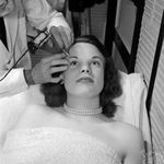 George Burchett tattooing permanent eyebrows on a female client #GeorgeBurchett #permanentmakeup #tattooedeyebrows #cosmetictattooing #historictattoos