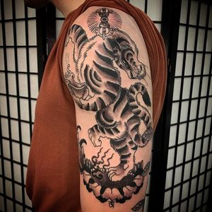 Unalome fire with tiger tattoo by Yeshe #Yeshe #tiger #unalome #fire #blackandgrey #lotus #skullcup #surreal #buddhism #buddhist